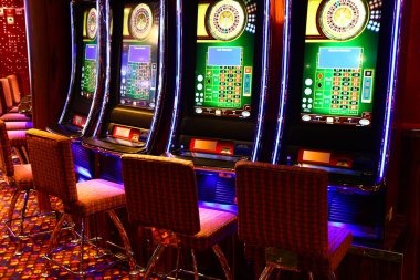 Microgaming jackpot panel and payment selector